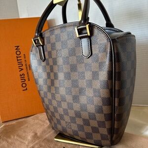 Louis Vuitton GM Sarria Seau Damien Ebene Canvas Handbag.